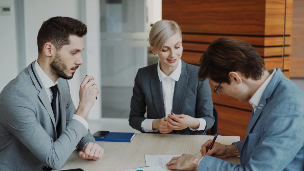 Business people with a witness