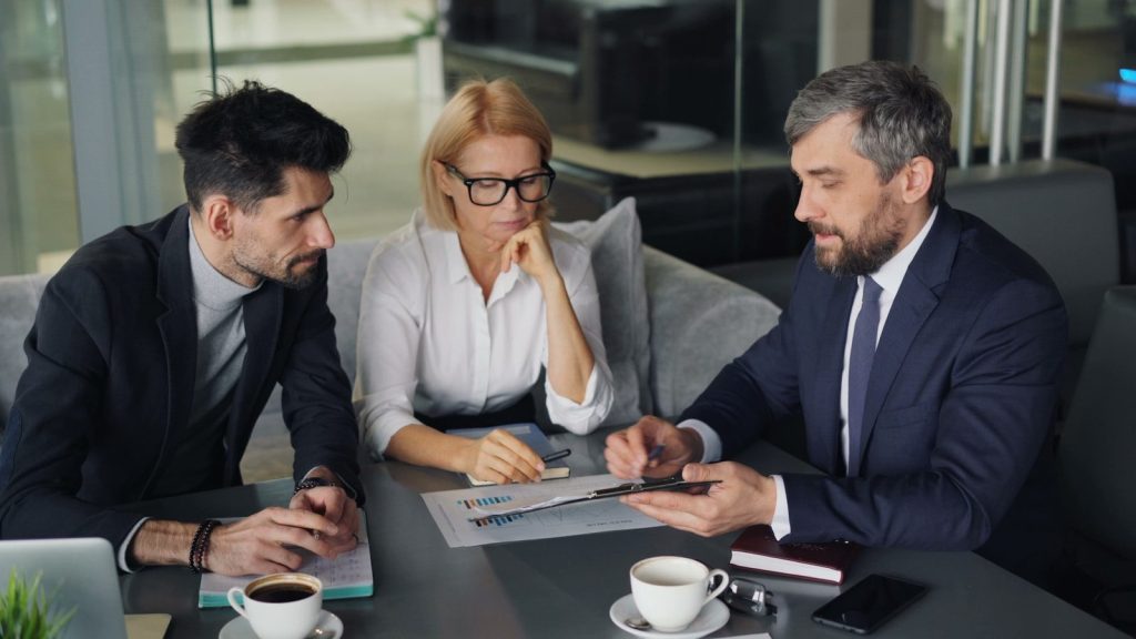 managers sitting around a table
